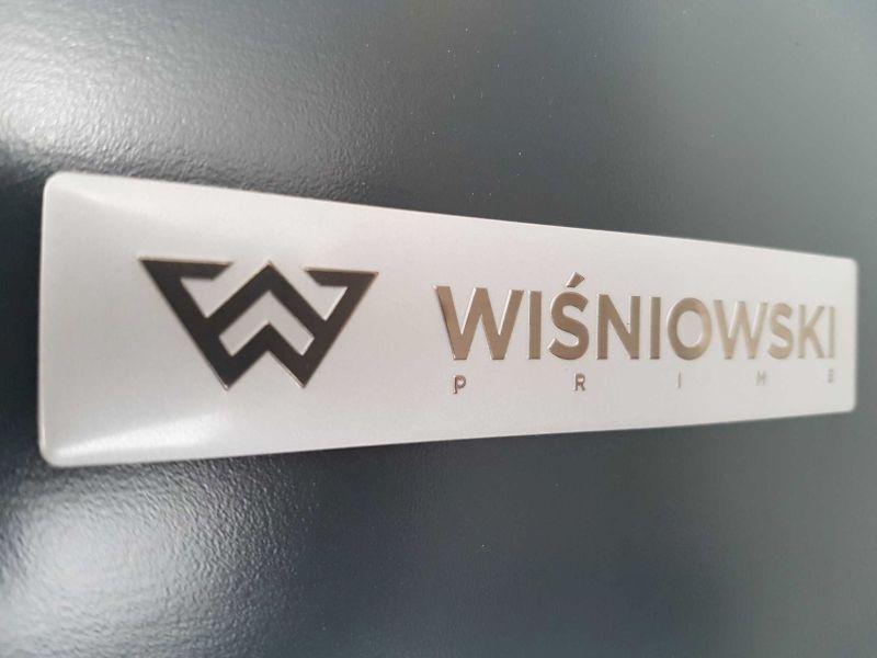 Garážové brány, oplotenia  - ploty, dvere, okná WIŚNIOWSKI POPRAD | logo